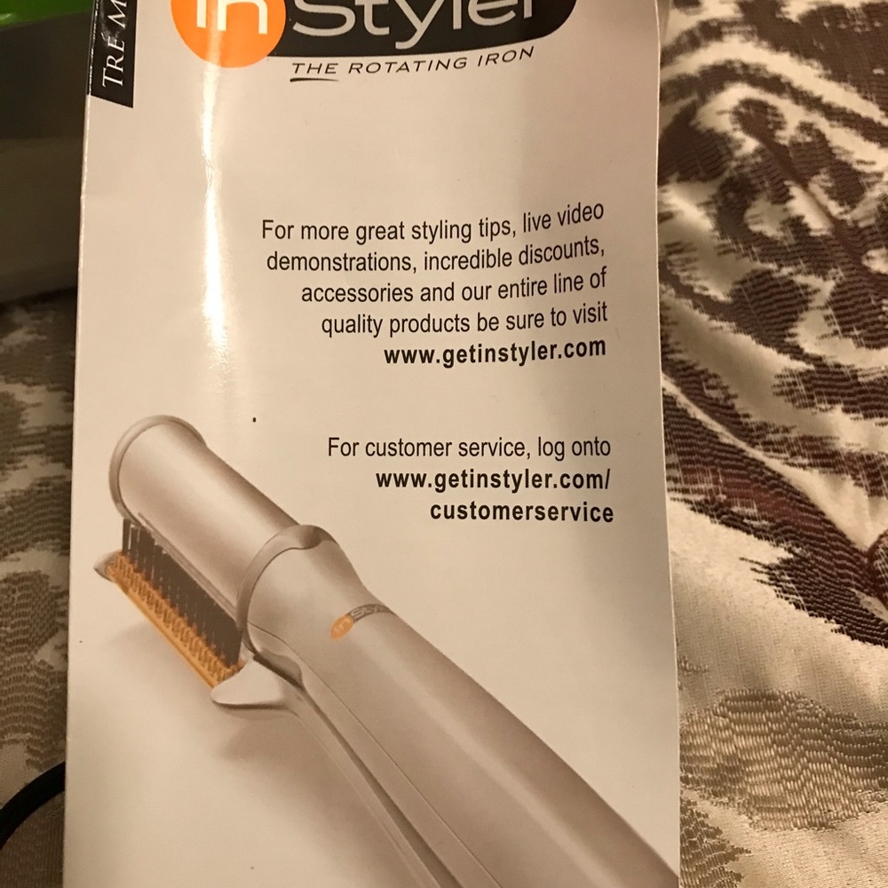 Brand new InStyler the rotating Iron